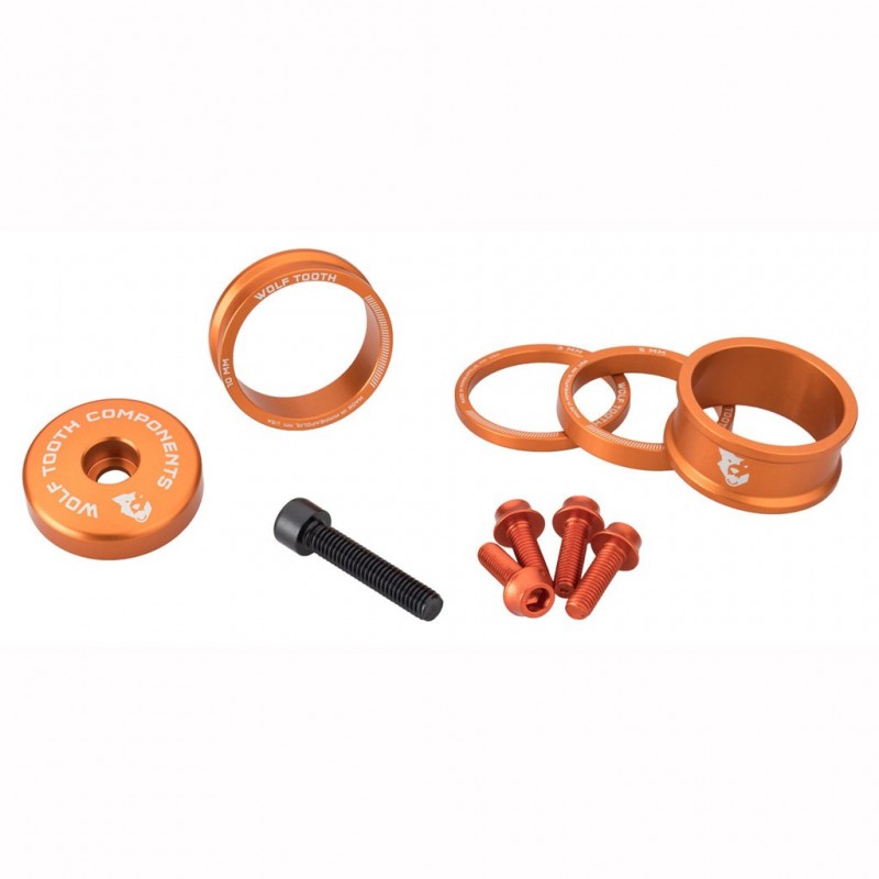 Sada distančních podložek, krytu představce a šroubů WOLFTOOTH BLING KIT Orange